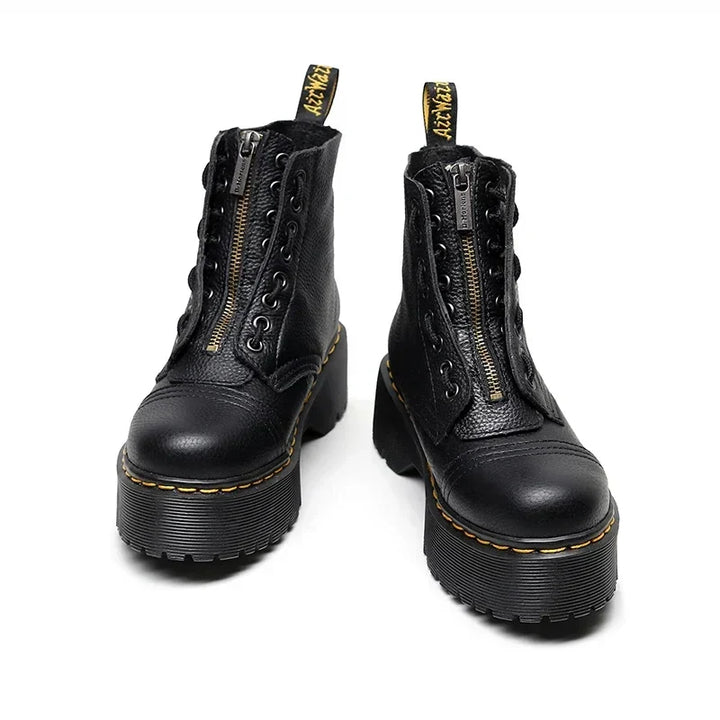 Populaire zwarte leren dames enkellaarzen met comfortabele dikke zool. Trendy en veelzijdig voor damesmode.