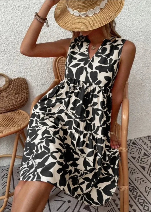 Zomerjurk dames V-hals, toont losse pasvorm en comfort, een veelzijdige en elegante keuze.