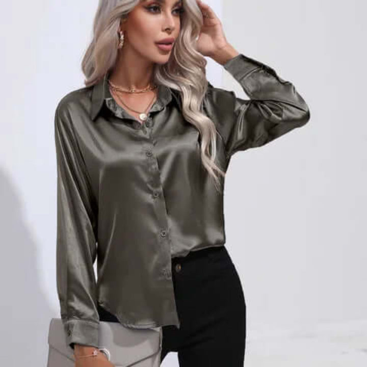 Chique damesblouse voor zakelijke kleding, comfortabele losse pasvorm en lange mouwen.