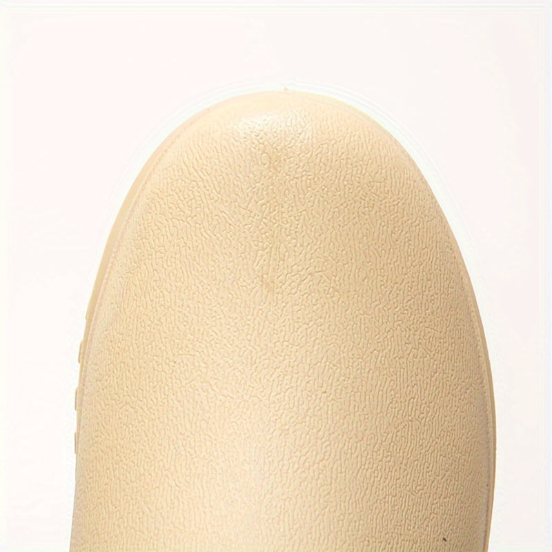 Stijlvolle waterdichte dames regenlaarzen met warme fleecevoering, perfect voor koud weer.