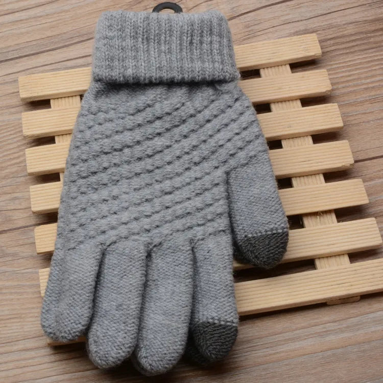 Dames gebreide handschoenen Amara met touchscreen functie, een essentieel winteraccessoire.