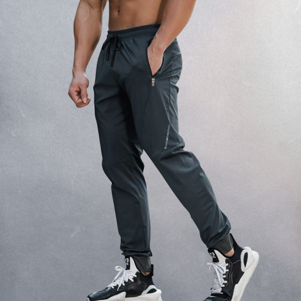 Comfortabele heren sportbroek met elastische tailleband, ideaal voor training en lente vrijetijd.