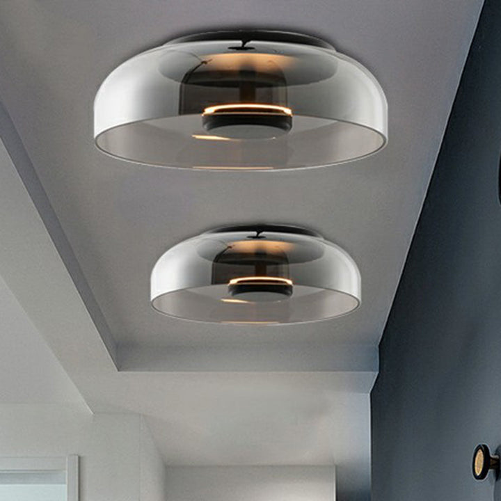Moderne LED plafondlamp met elegant design voor hal en entree. Energiezuinige sfeerverlichting in rookgrijs of amber.