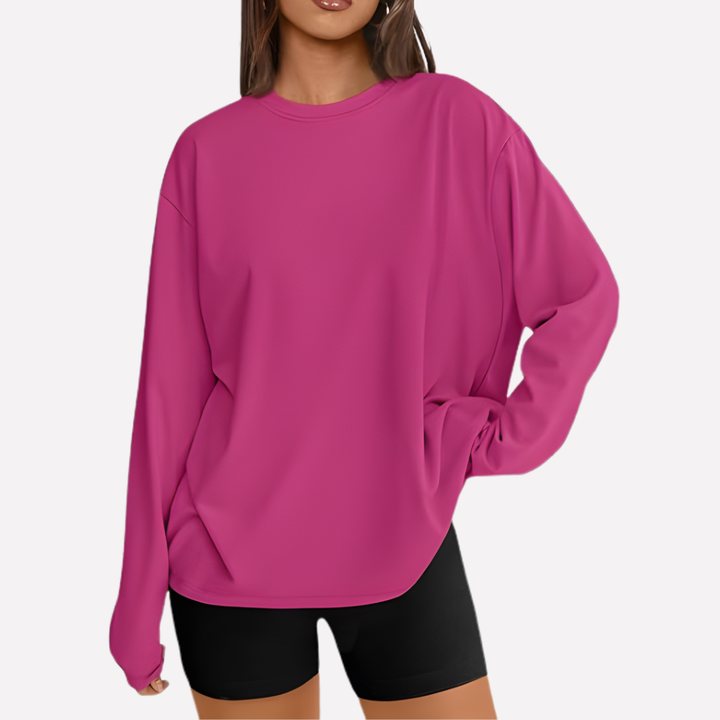 Oversized lang mouw shirt in detail, toont zachte stof en comfortabele pasvorm voor vrouwen.