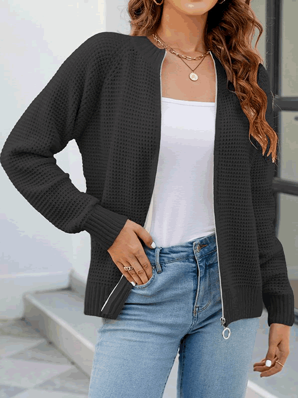 Effen damesvest met ritssluiting, lange mouwen, perfect voor een casual outfit.