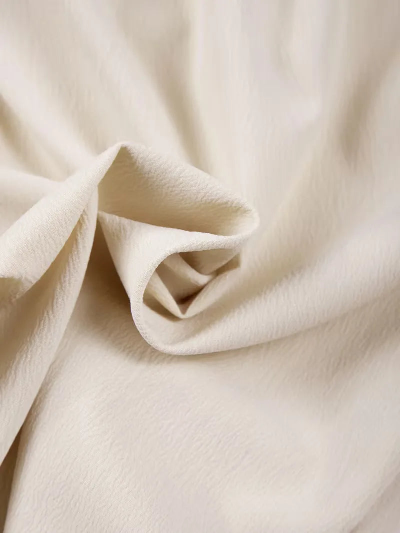 Witte plissé shorts, herenmodel met losse pasvorm en trekkoord, voor ultiem draagcomfort.