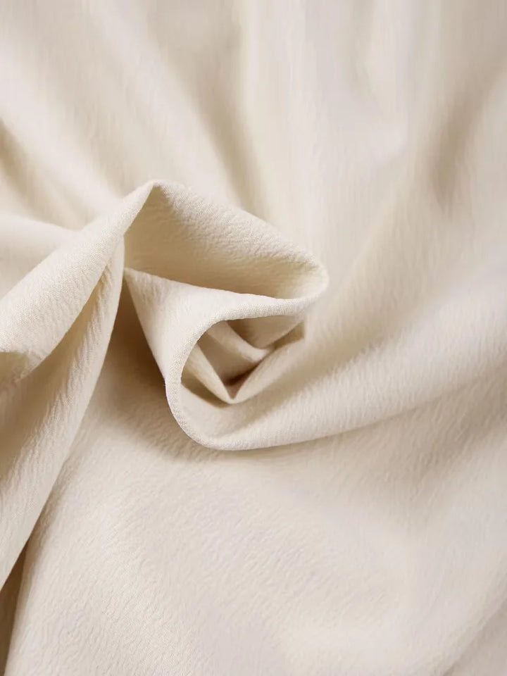 Witte plissé shorts, herenmodel met losse pasvorm en trekkoord, voor ultiem draagcomfort.