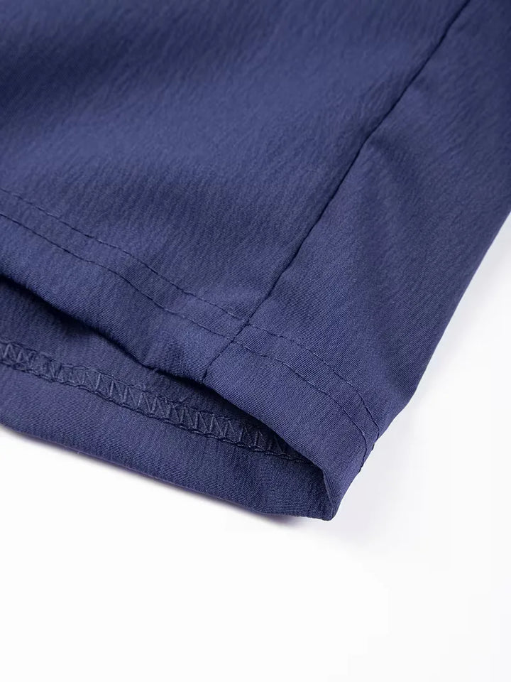 Beige heren plissé shorts, met elastische tailleband, gemakkelijk te combineren.