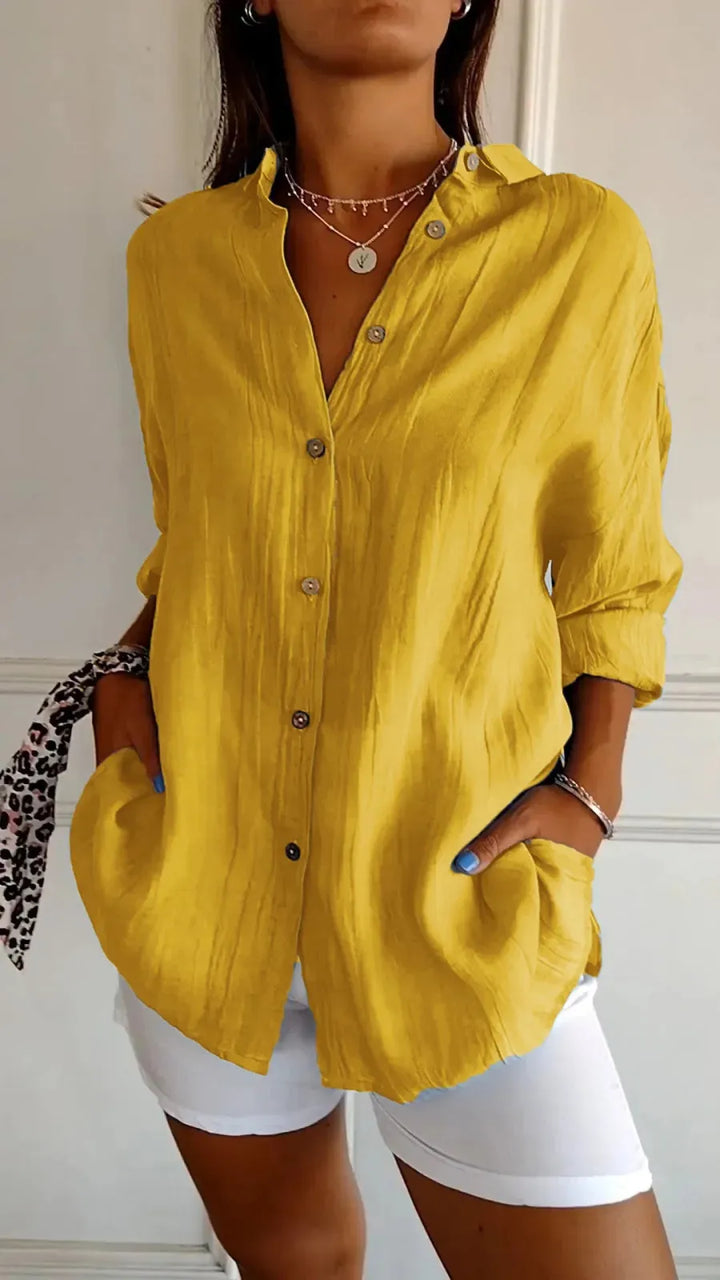Nieuwe dames blouse: elegante plooitop met reverskraag en lange mouwen. Perfect voor lente/zomer.