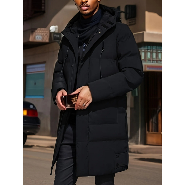 Stijlvolle heren Dom parka, warm en weerbestendig, ideaal voor de winter. Verkrijgbaar in zwart.
