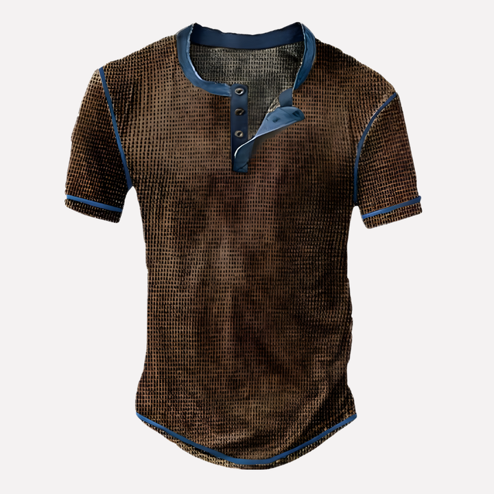 Stijlvol heren T-shirt van wafel breisel, ronde hals, losse pasvorm, klaar voor de zomer.