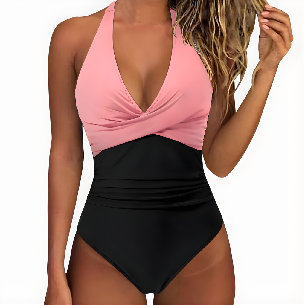 Dames badpak, geplooid en comfortabel, perfect voor ontspanning aan het water.