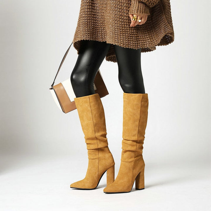 Elegante dameslaarzen met hoge hak en moderne stijl, perfect voor herfst en winter. Combineert comfort met klasse.