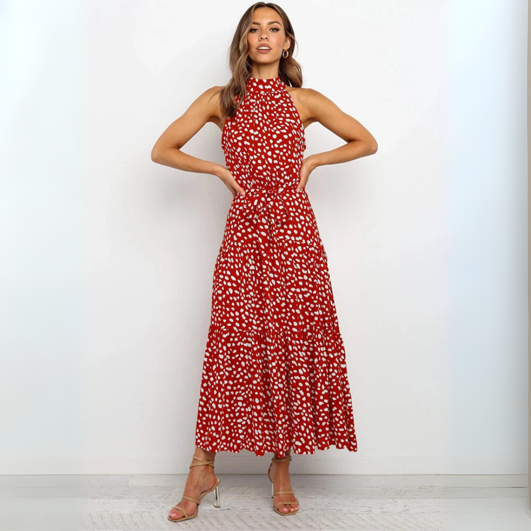 Polyester dames midi-jurk met stippenprint, mouwloos, casual en elegant te combineren.