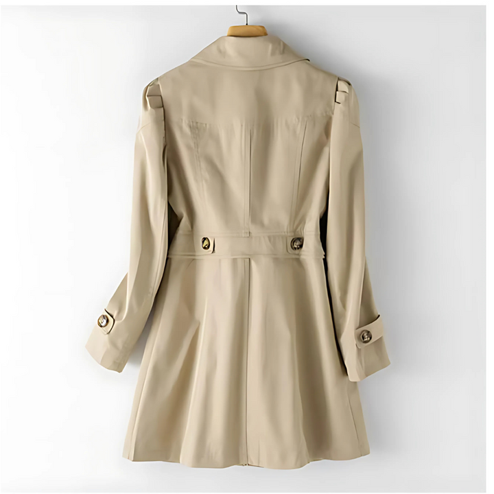 Elegante dames trenchcoat met lange mouwen, perfect voor een modieuze lente- of herfstlook.