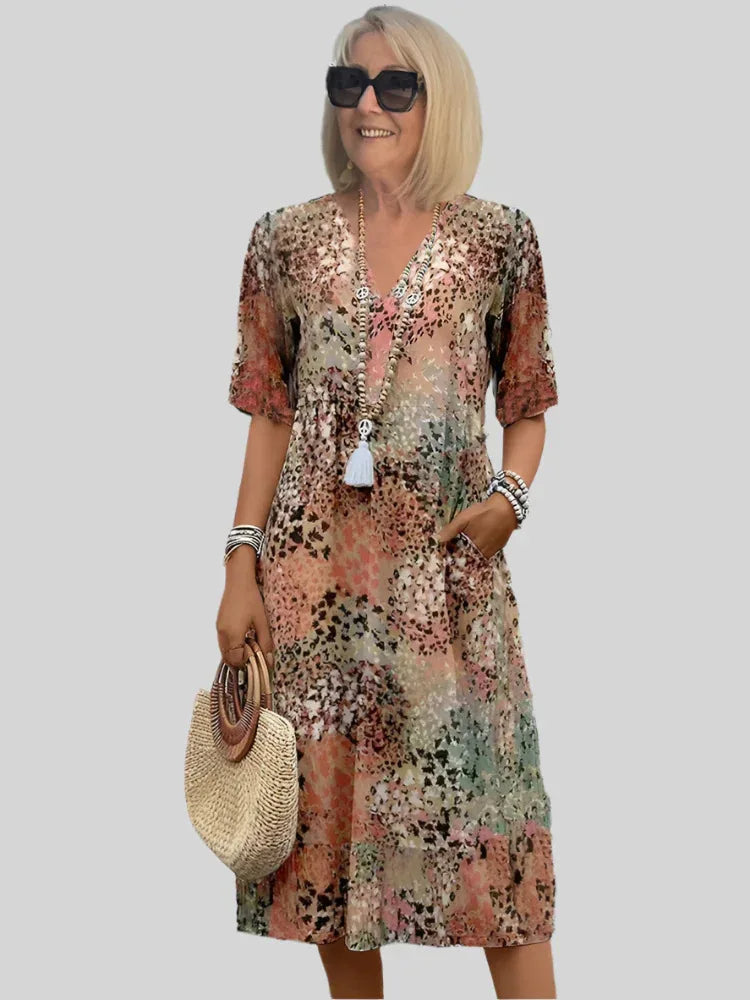 Casual A-lijn dames jurk met vintage bloemenprint, kant en v-hals. Comfortabele lentemode voor elke dag.