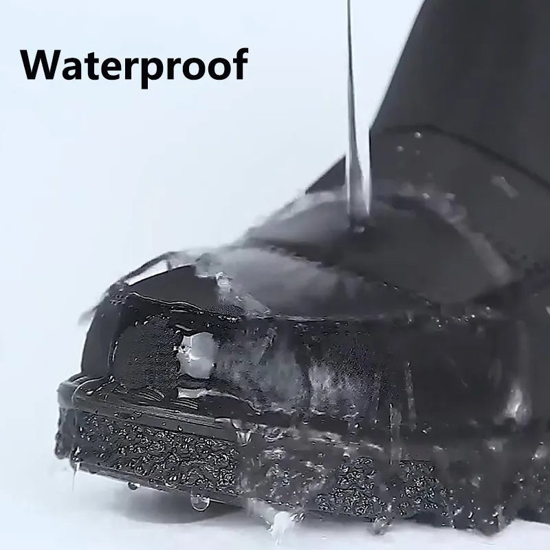 Zwarte waterdichte snowboots met dikke plateauzool, geschikt voor dames en heren.