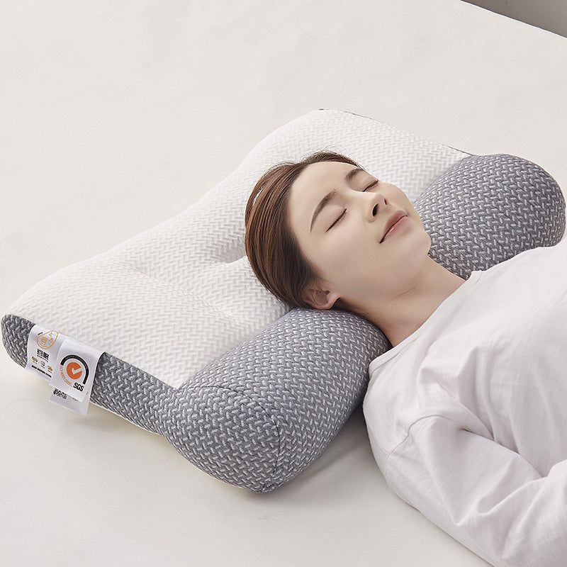 Comfortabel ergonomisch neksteunkussen in een slaapkamer. Ondersteunt de nek voor een gezonde, diepe slaap.