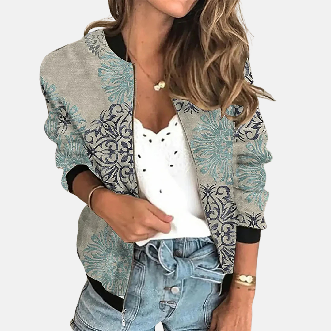 Stijlvol dames bomberjack met levendige digitale print. Perfect voor een vintage-geïnspireerde, comfortabele look.