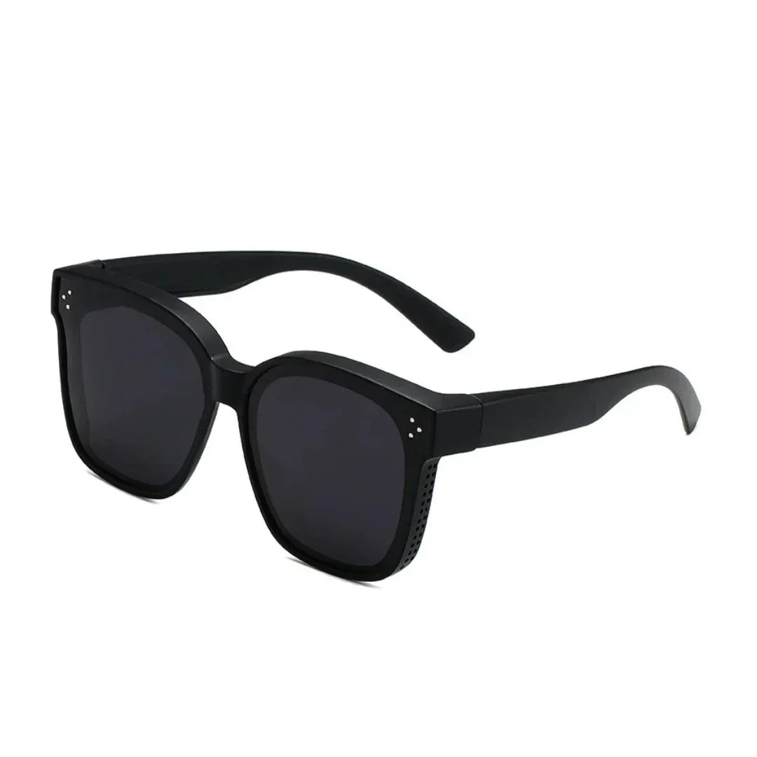 Overzet zonnebril unisex voor brildragers met UV400 bescherming. Stijlvol en praktisch voor optimale oogbescherming.