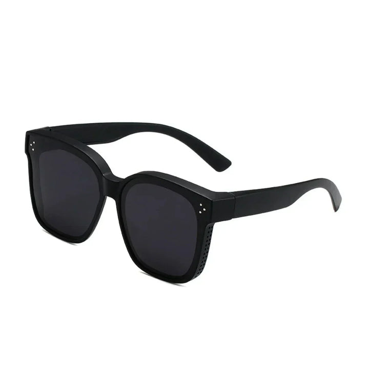 Overzet zonnebril unisex voor brildragers met UV400 bescherming. Stijlvol en praktisch voor optimale oogbescherming.