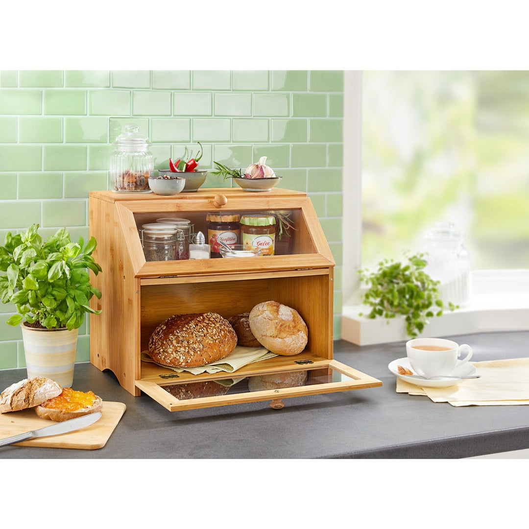 Elegante gebaksvitrine met 2 etages, ideaal voor het bewaren en presenteren van brood en patisserie op tafel.