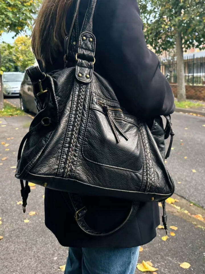 Luxe zwarte dames schoudertas van veganistisch leer. Elegant design, ideaal voor elke outfit.