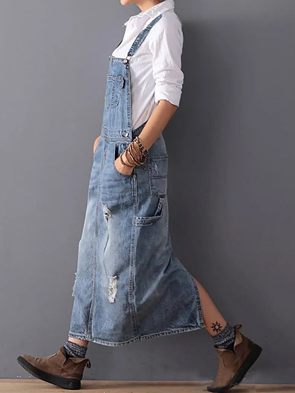 Comfortabele lichtblauwe spijkerjurk dames, dungaree model met verstelbare bandjes en trendy rugsplit.