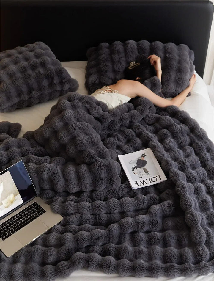 Ultieme comfortabele deken; pluizig en warm, perfect voor ontspanning in elke woning.