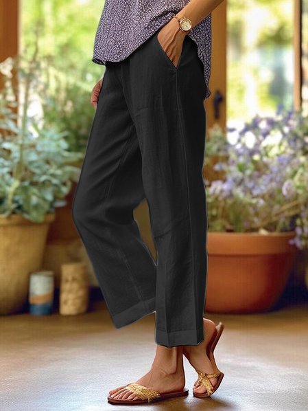 Elegante linnen damesbroek met hoge taille en rechte pijpen, geschikt voor vrijetijdskleding en zomerse mode.