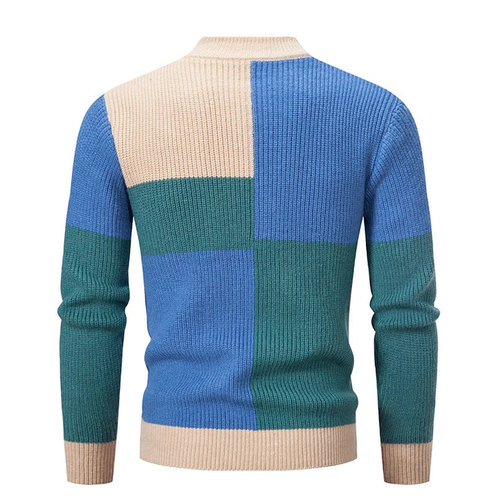 Patchwork heren trui met uniek gekleurd design. Ideaal als warme en casual herfst/winter trui.