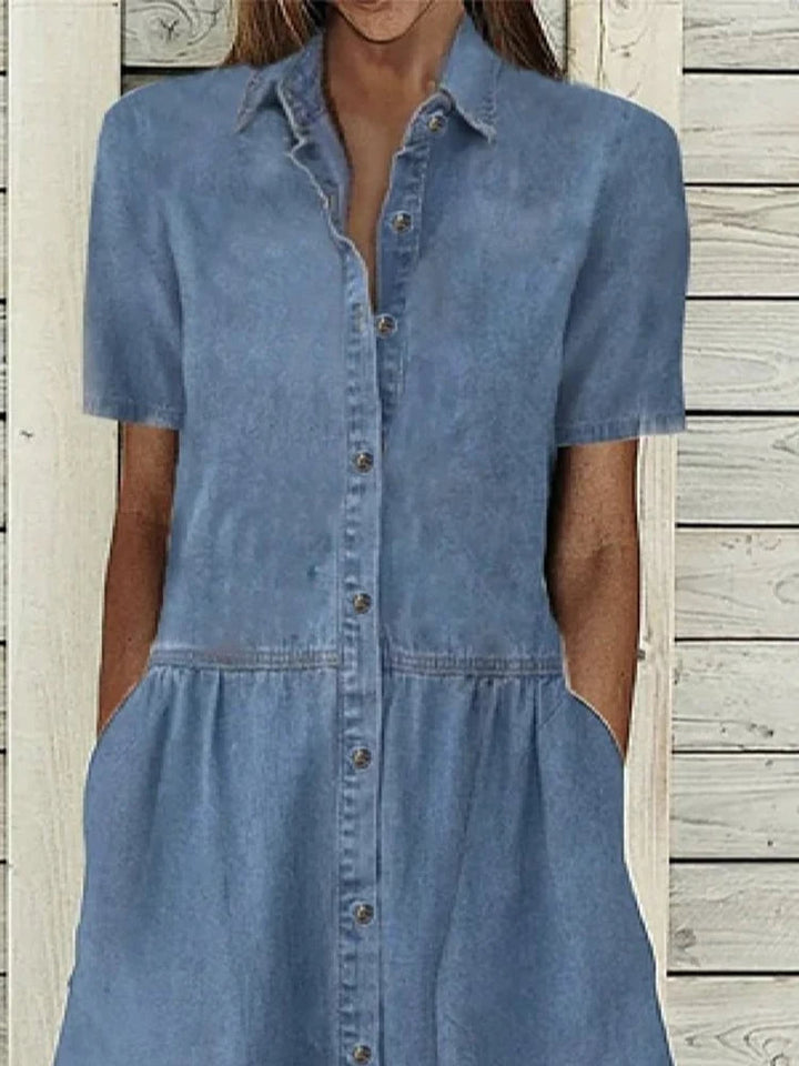 Comfortabele A-lijn damesjurk in denimlook polyester met knoopsluiting, perfect voor elke gelegenheid.