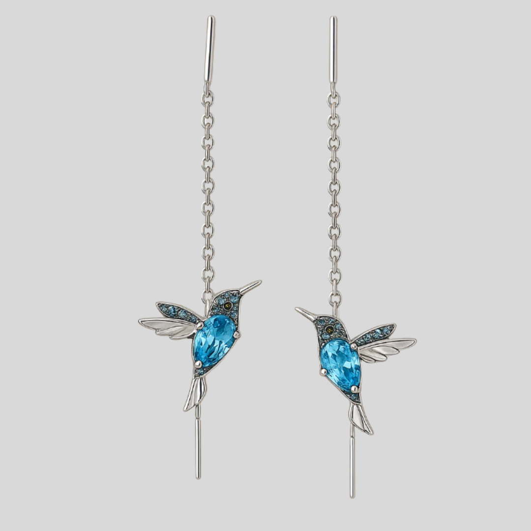 Chique dames oorbellen: goudkleurige kolibries met glinsterende kristallen, een elegant accessoire.