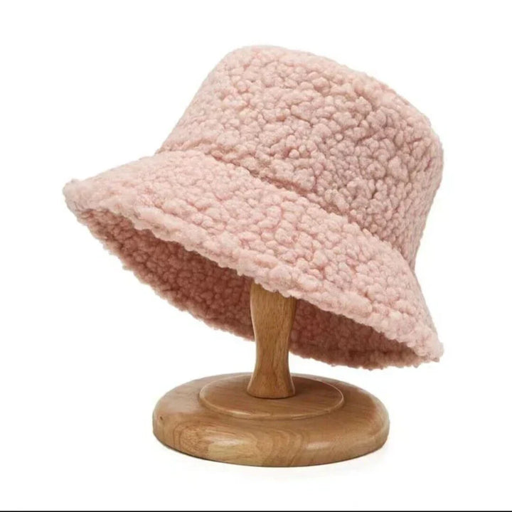 Livia teddy bucket hoed, dames winteraccessoire van zachte lamswol, warm en fashion statement.