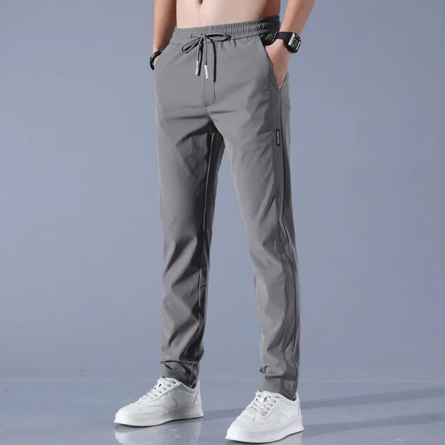 Veelzijdige heren flex comfortbroek voor sport, lounge en casual gelegenheden. Rechte pijpen.