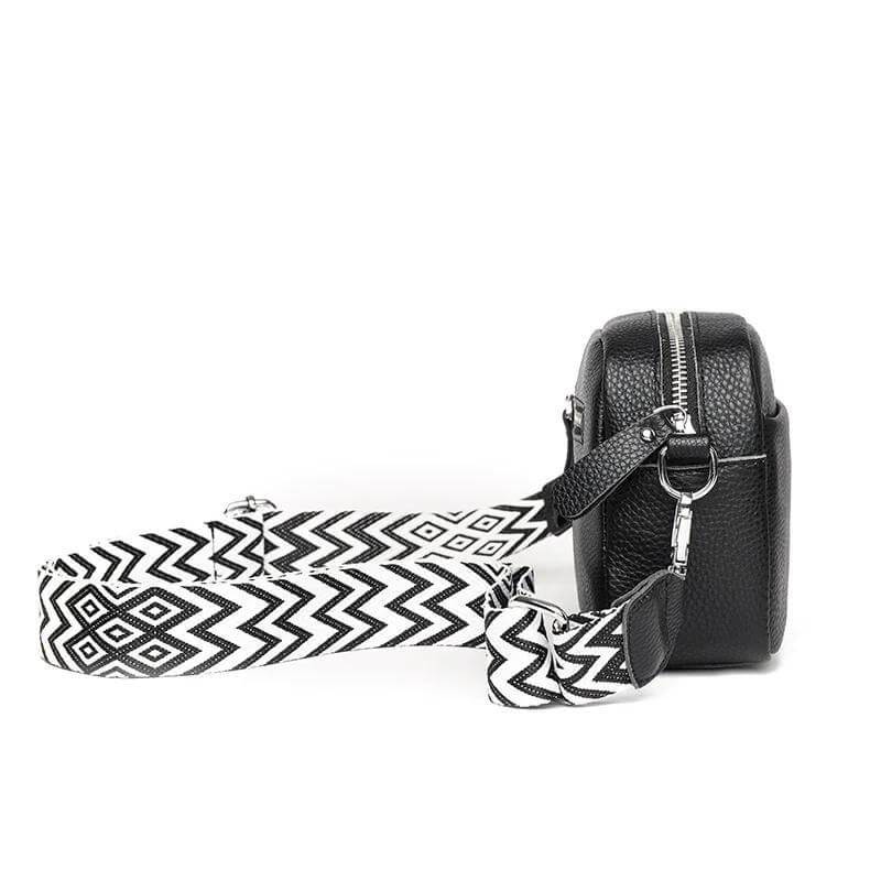 Compacte elegante leren dames handtas, ideaal als schoudertas voor dagelijks gebruik.