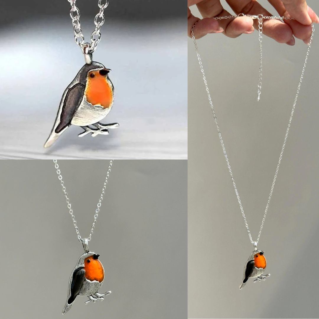 Elegante geluksvogel oorbellen, onderdeel van een dames sieradenset, symbool van een frisse start en hoop.