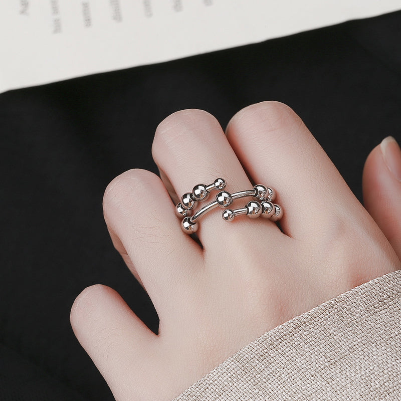 Stijlvolle fidget ring als sieraad voor dagelijks gebruik, biedt kalmte en stressverlichting.