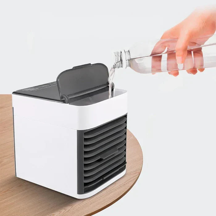 Mini-airconditioner met sfeervol 7-kleurig LED licht. Verkoelt, bevochtigt en zuivert de lucht.