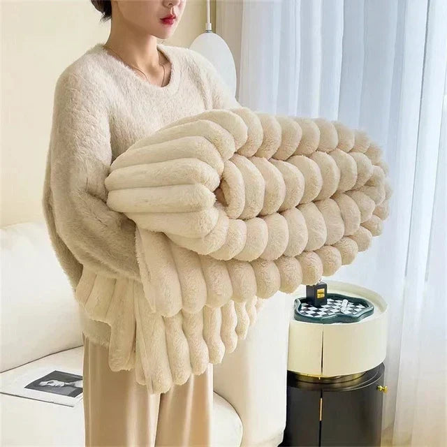 Zachte pluche CozyWrap woondeken, ideaal als comfortabele warmtedeken voor de slaapkamer.
