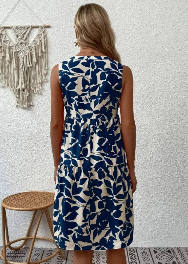 Modieuze V-hals zomerjurk voor dames, een must-have voor casual en elegante zomeroutfits. Kleurrijk.