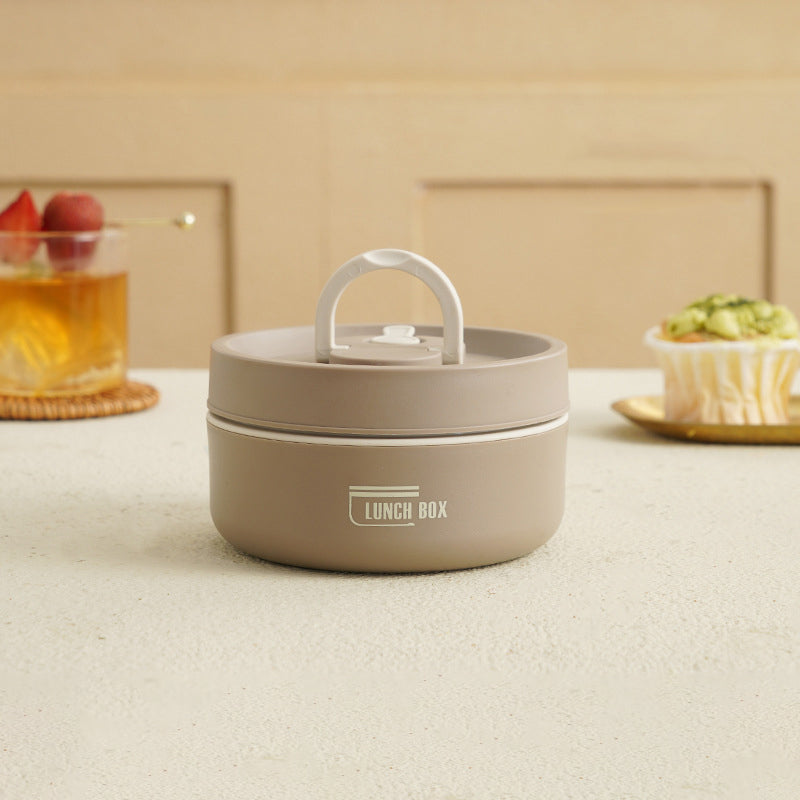 Close-up van de roestvrijstalen Isobox™ lunchbox, lekvrij ontwerp voor diverse maaltijden.