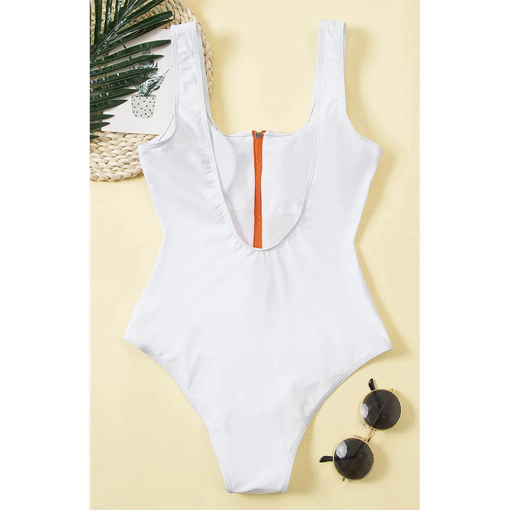 Trendy dames zwemkleding: een badpak met rits, perfect voor een dagje aan het zwembad.
