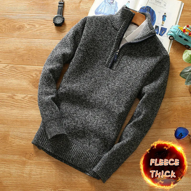 Warme heren pullover met opstaande kraag en halve rits, perfect voor koude dagen. Casual mannenmode.