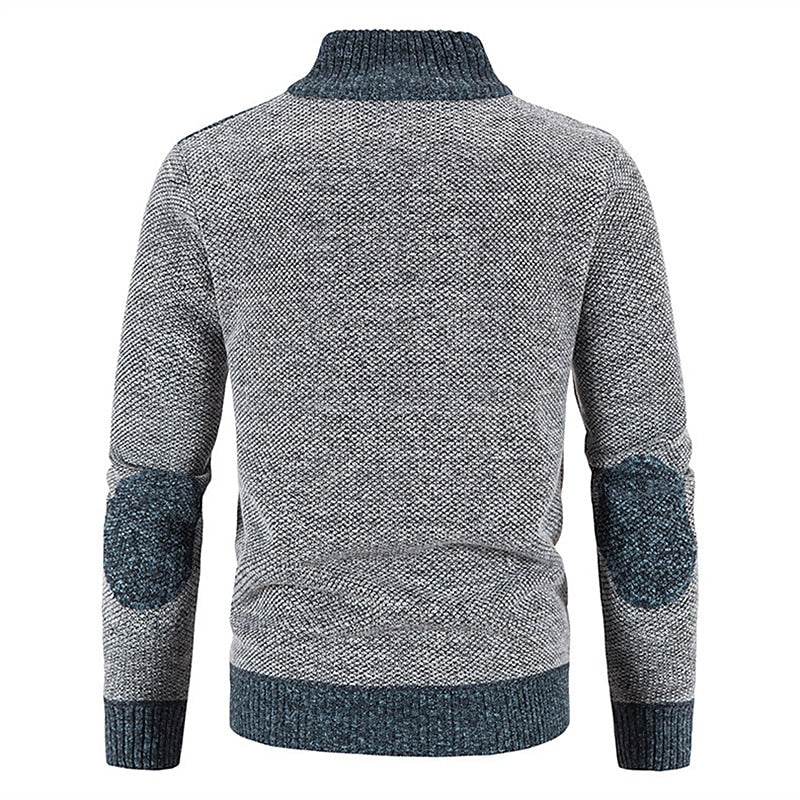 Zacht aanvoelend wollen herenvest met ritssluiting, gebreid voor optimaal comfort en warmte in de koudere maanden.
