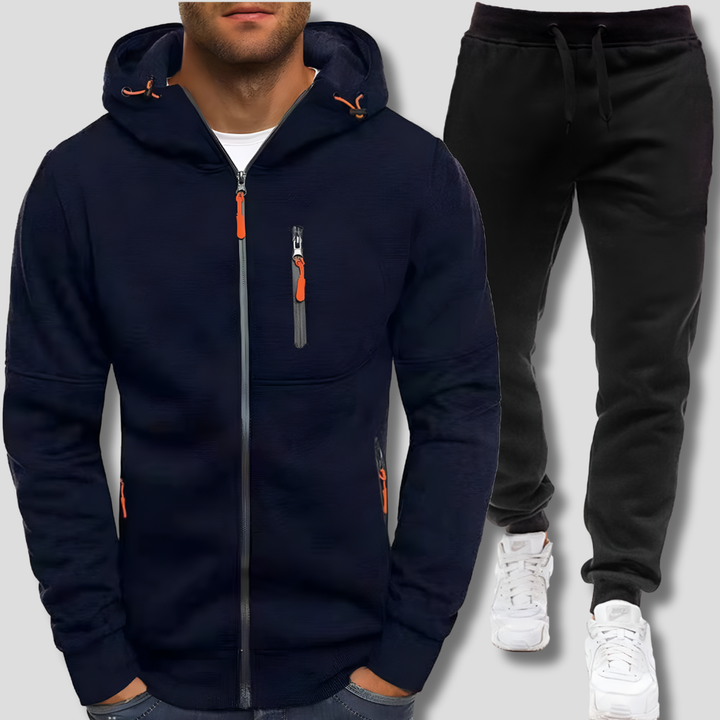 Stijlvol heren trainingspak, comfortabel voor sport of casual vrijetijdskleding. Complete sportieve outfit met pullover en broek.