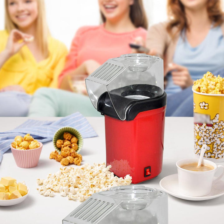 Stijlvolle rode popcornmaker, essentieel keukenapparaat voor gezellige filmavonden.
