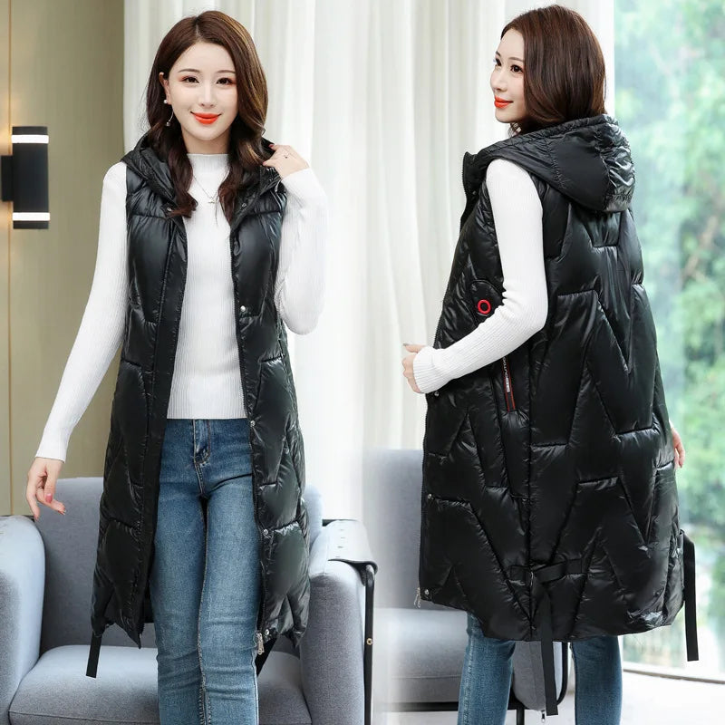 Warme puffer bodywarmer voor dames, lange effen winterjas model, ideaal voor koude dagen.