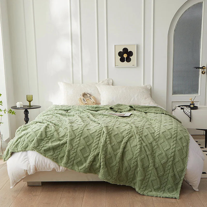 Warme tweezijdige lamswollen deken, perfect als zacht plaid voor winteravonden. Comfortabele woondeken.