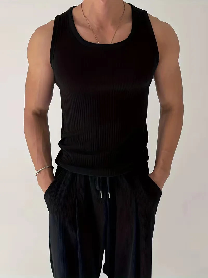 Zwarte heren slimfit tanktop voor fitness & sport. Ideaal voor workout, hardlopen en zomerse dagen.